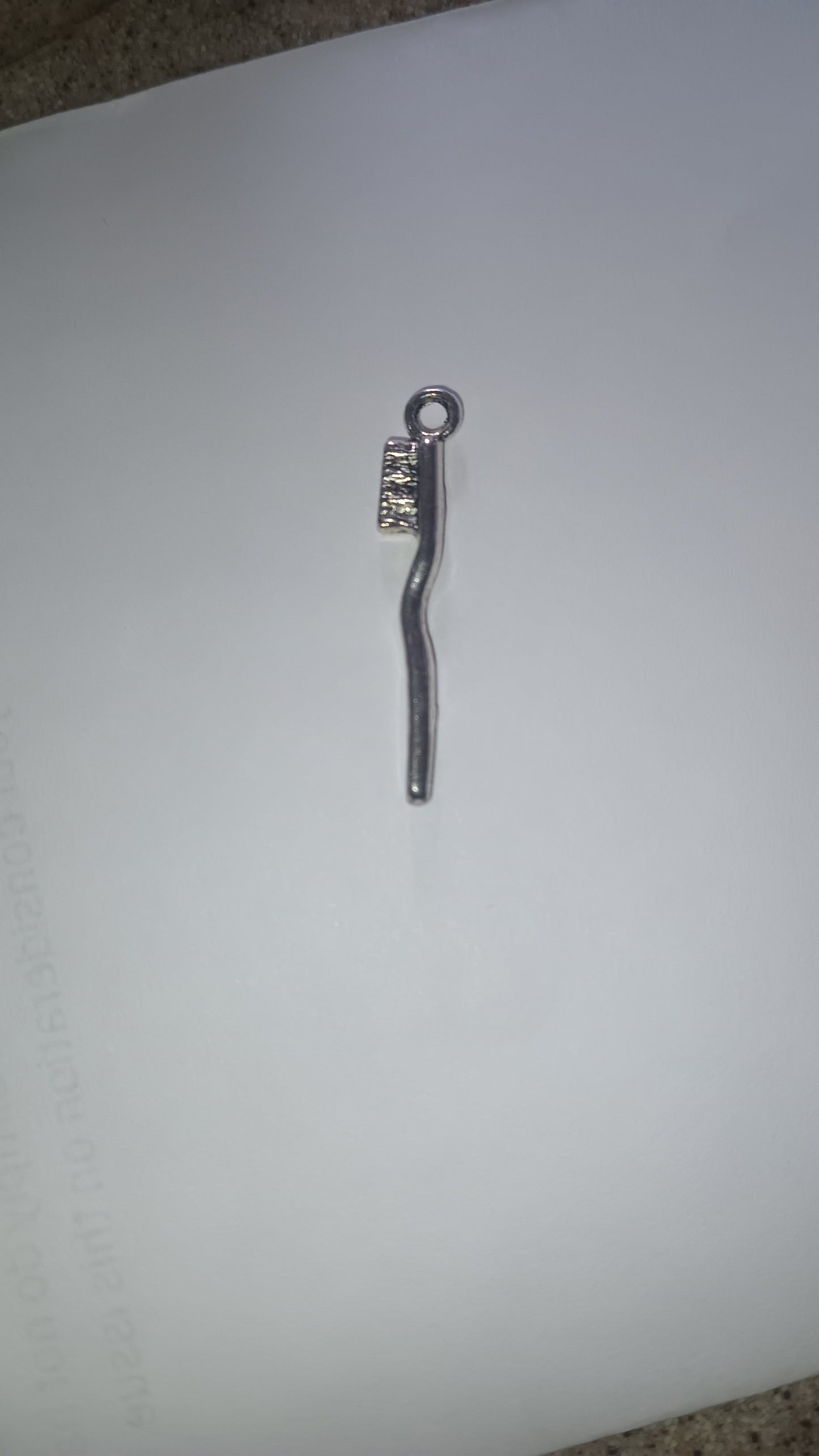 Holy Zuce-Brush Amulet