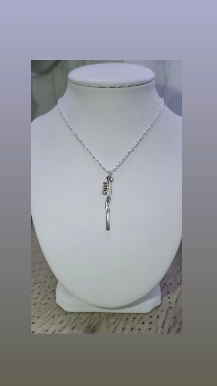 Holy Zuce-Brush Amulet